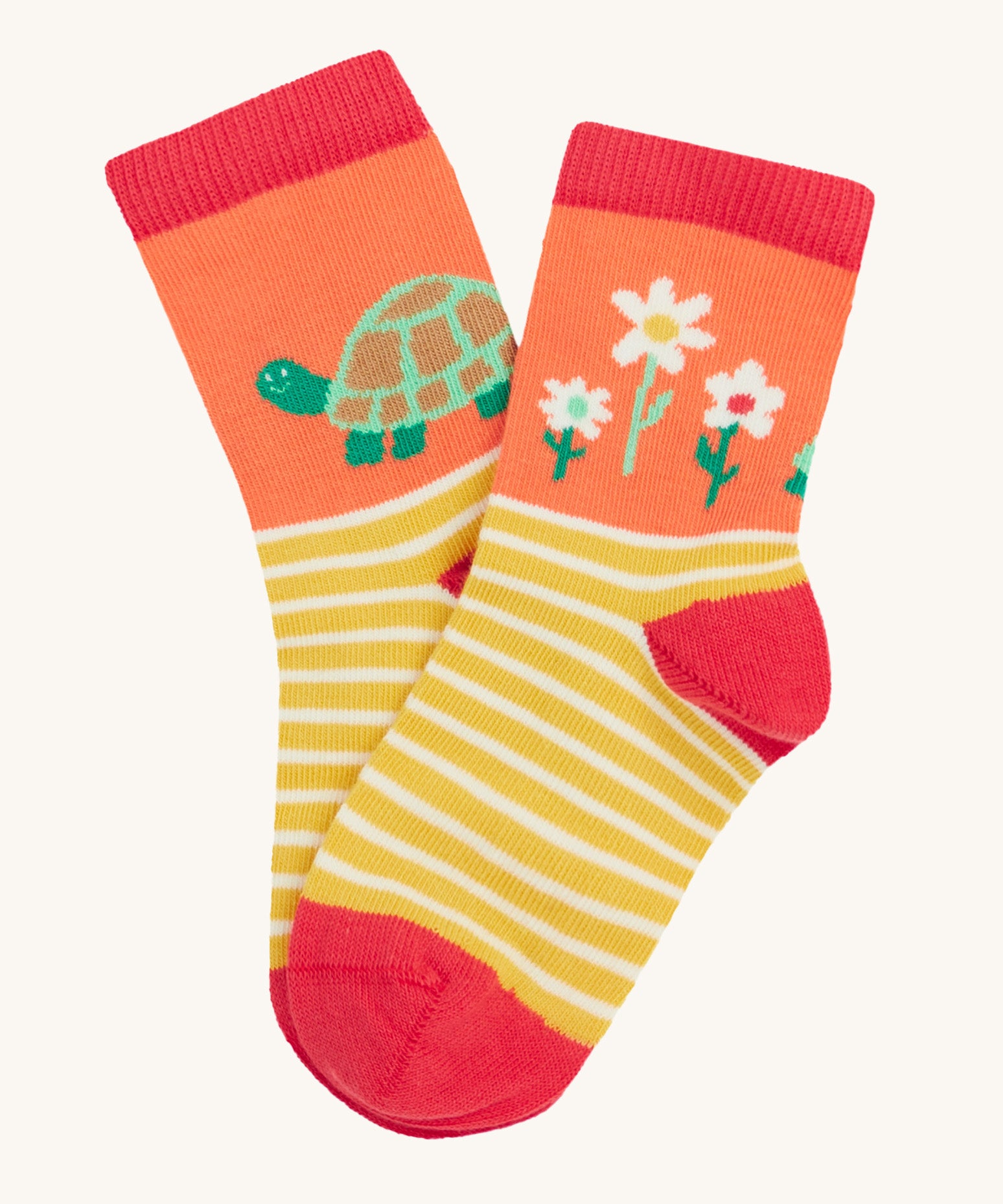 Frugi single little sock daisy design on a cream background