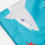 Frugi blue swim shorts deep dea diver print detail