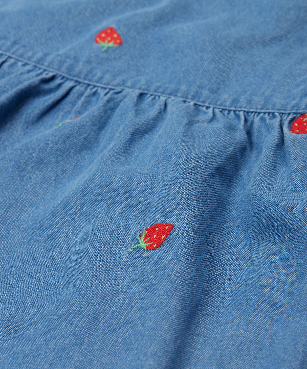 Frugi blue denim dress strawberry design print detail