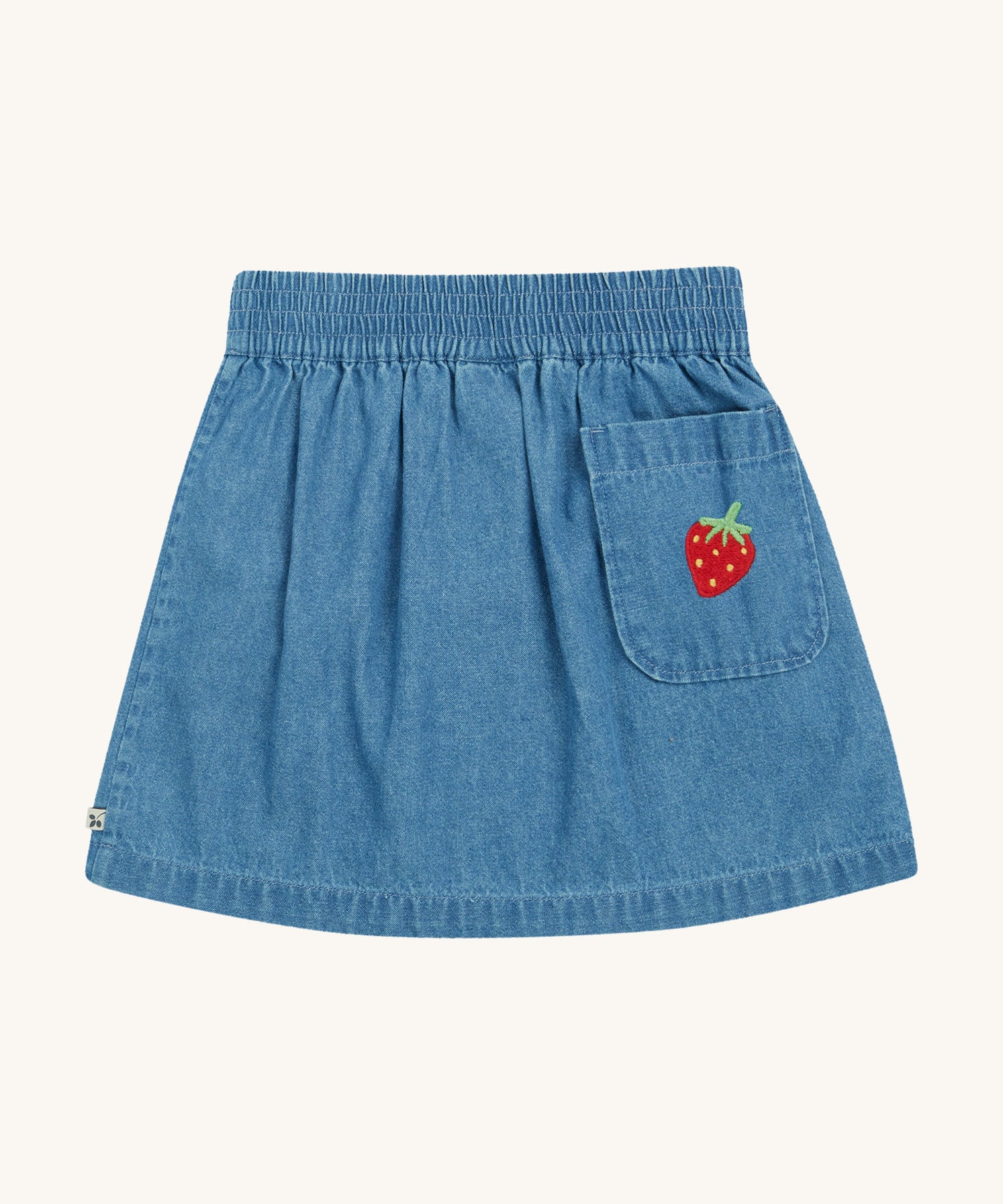 Frugi kids denim skirt with a flower, rainbow and strawberry design  back pocket detail