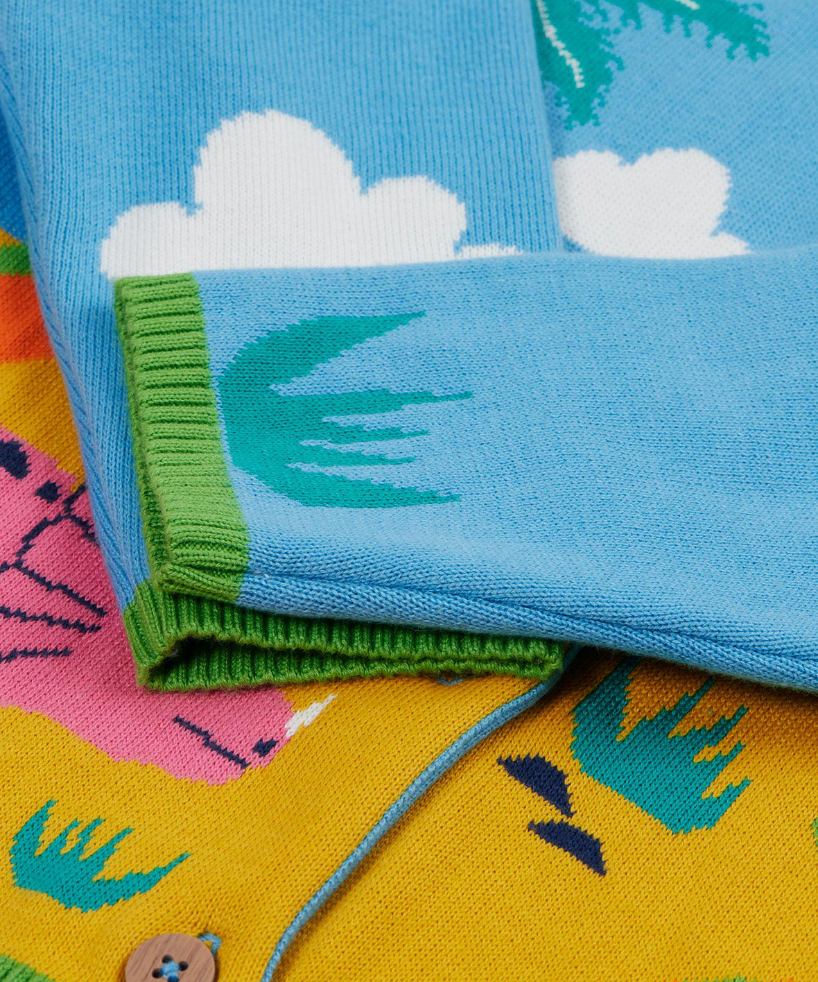 Frugi blue knitted cardigan dino cuff detail