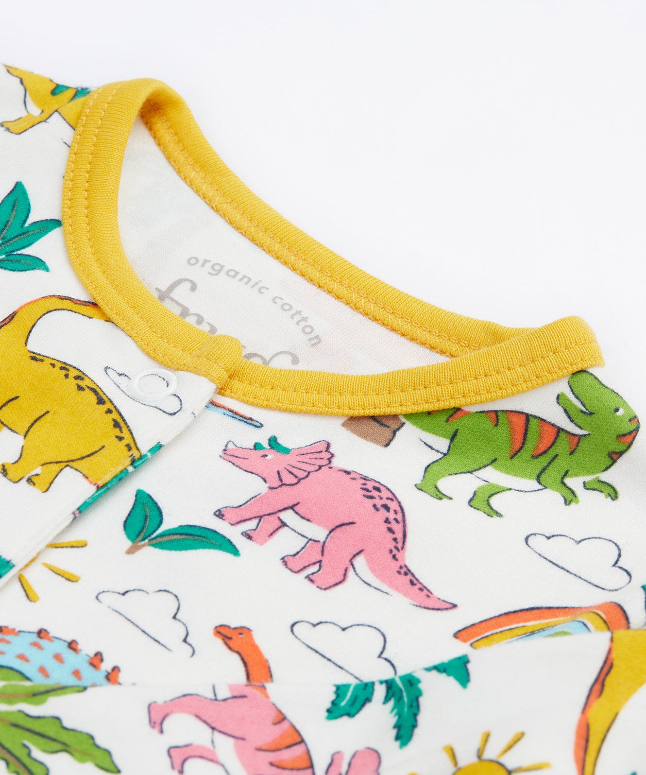 Frugi white baby grow dino land neck detail