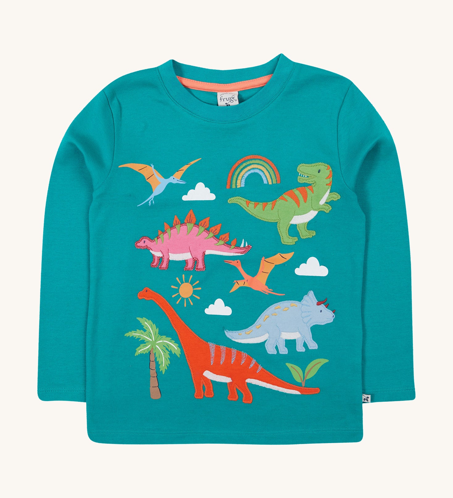 Frugi green adventure long sleeve top dinosaur design on a cream background