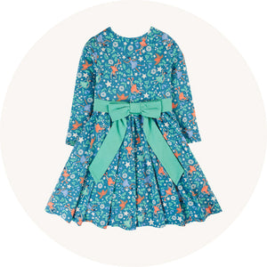 Frugi party skater dress on cream background to represent Frugi skirts and dresses range at Babipur.