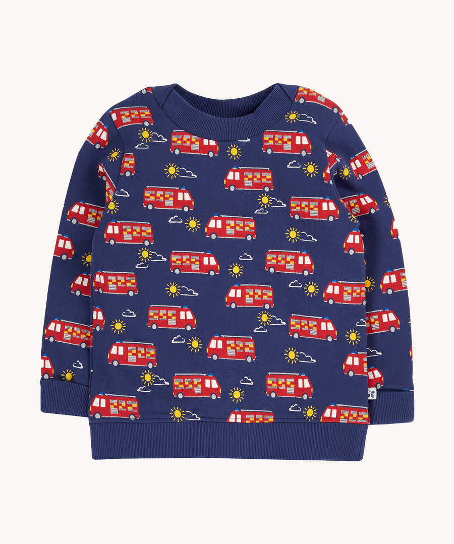 Frugi navy jumper fire engine design on a cream background.