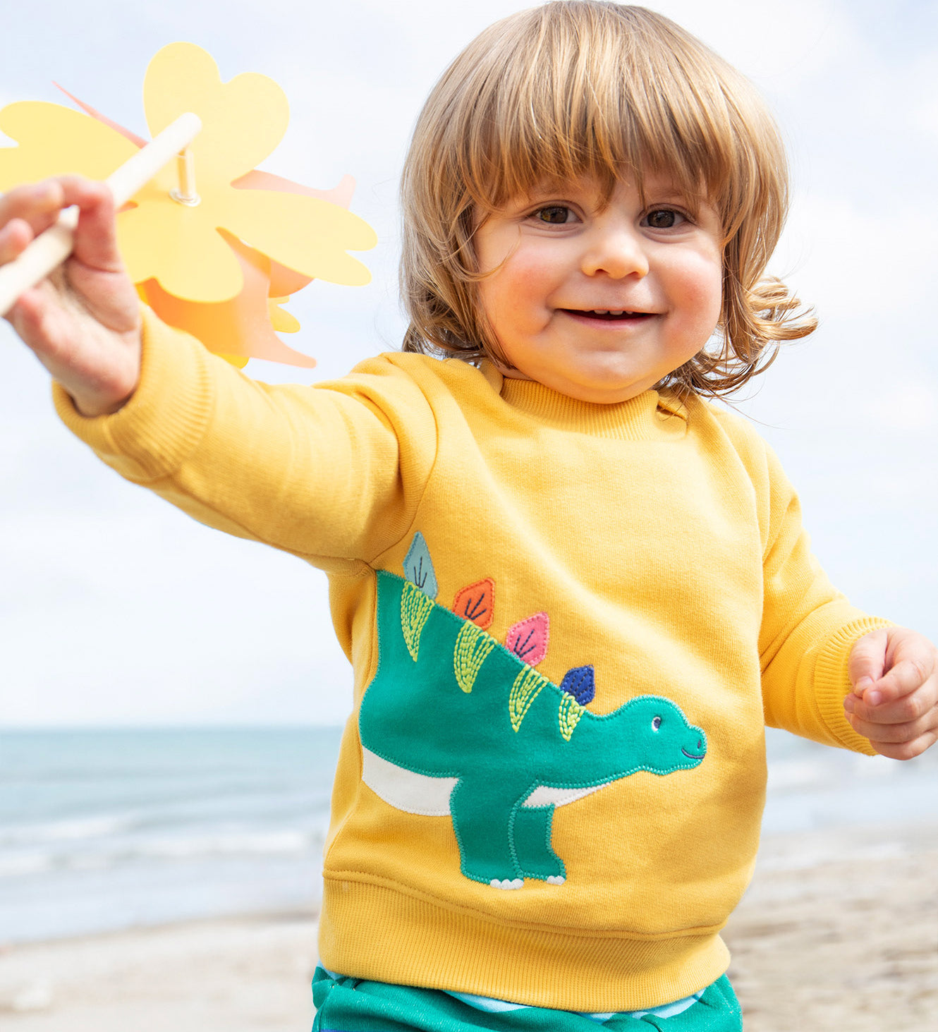 Frugi yellow easy on jumper dino design