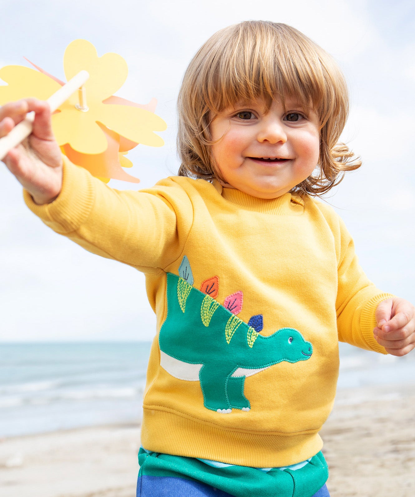 Frugi yellow easy on jumper dino design