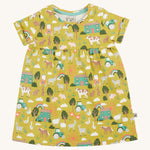 Frugi green dress farm life design on a cream background.