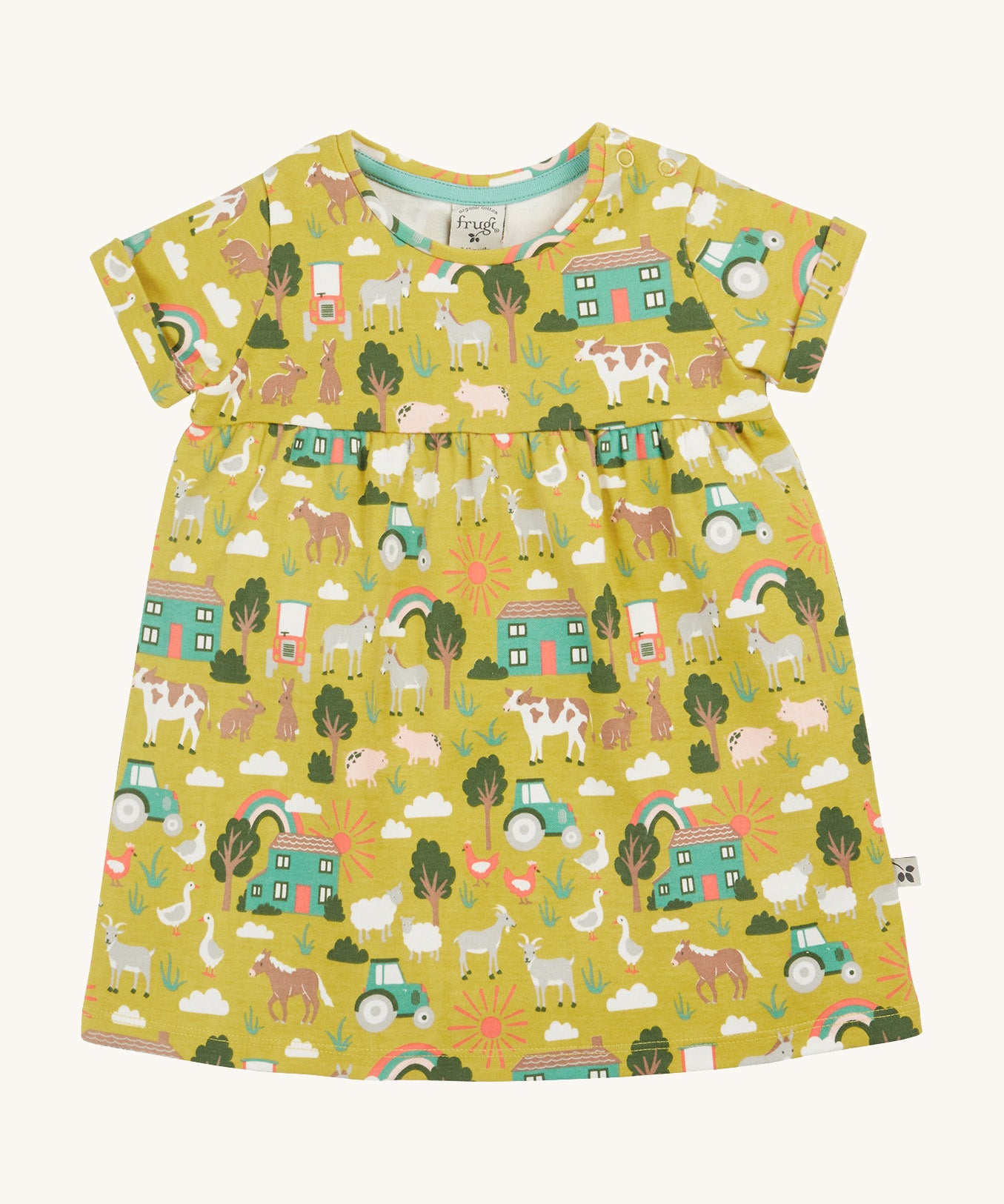 Frugi green dress farm life design on a cream background.