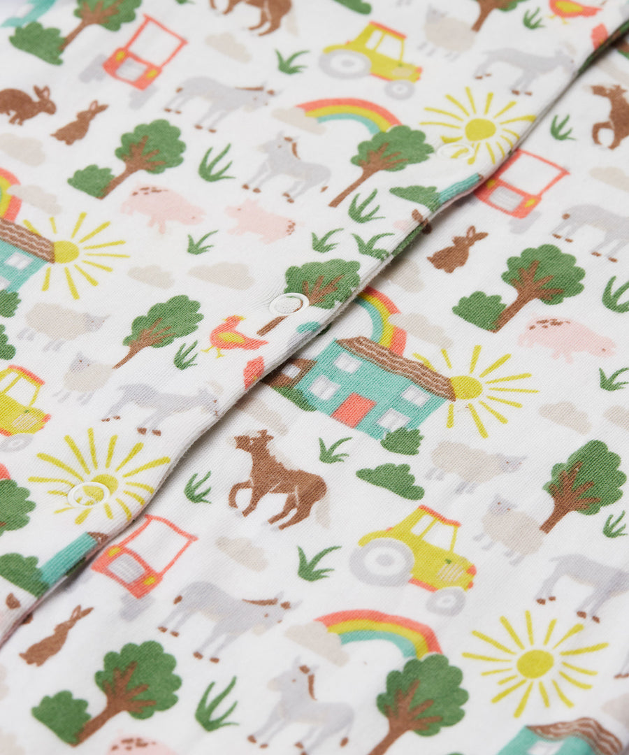 Frugi white baby grow farm life print detail