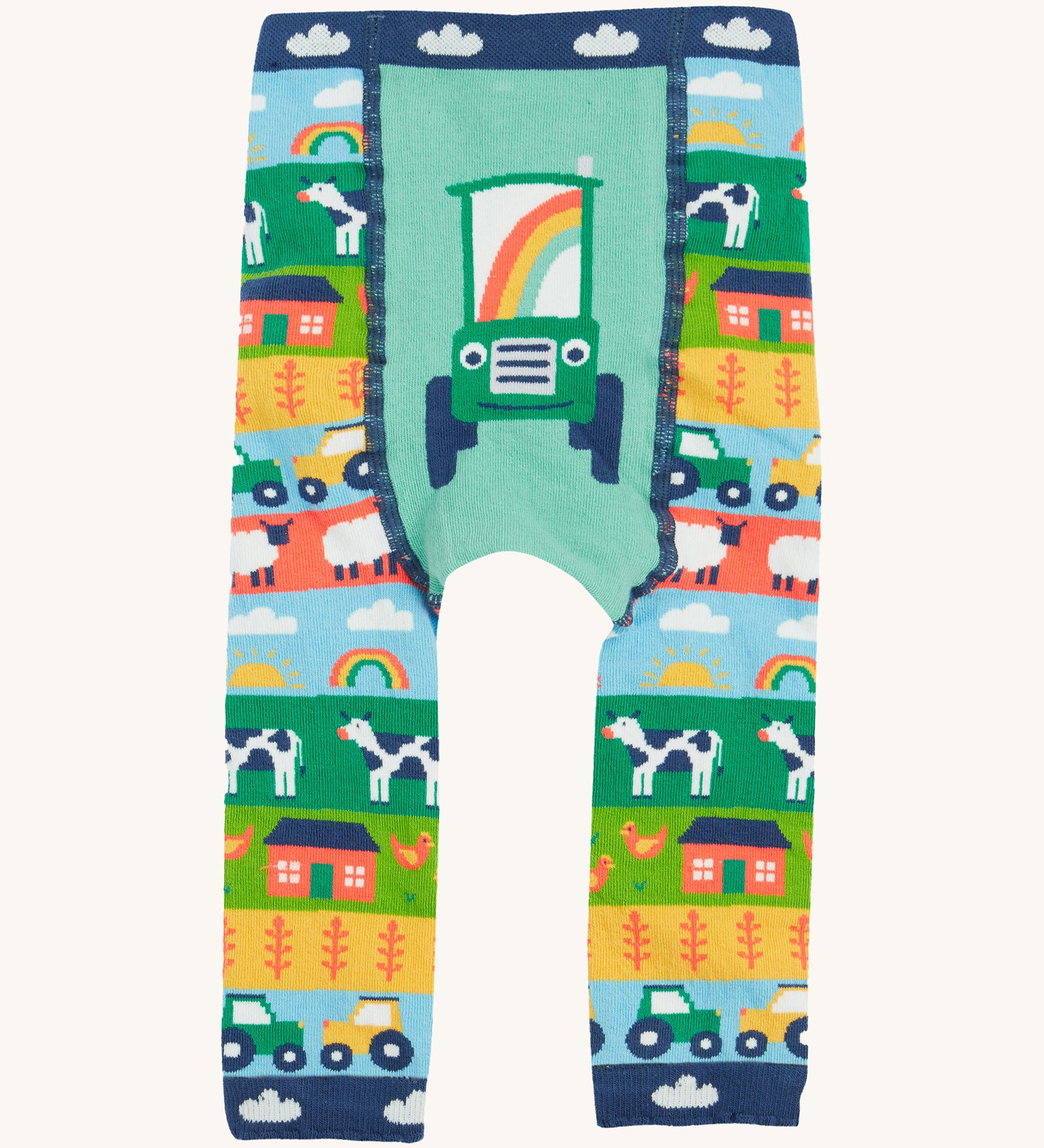 Frugi knitted leggings farm and tractor design on a cream background.