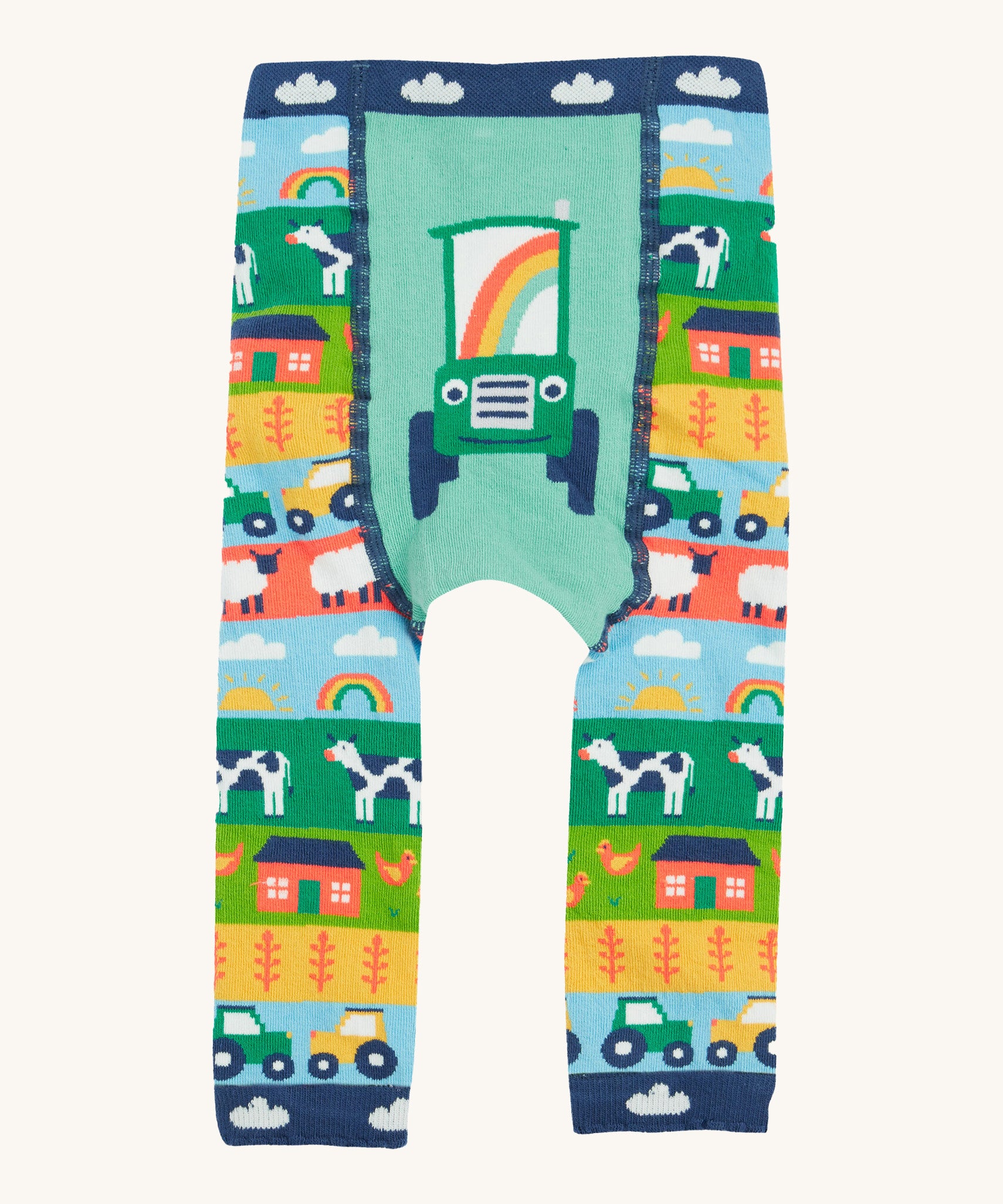 Frugi knitted leggings farm and tractor design on a cream background.