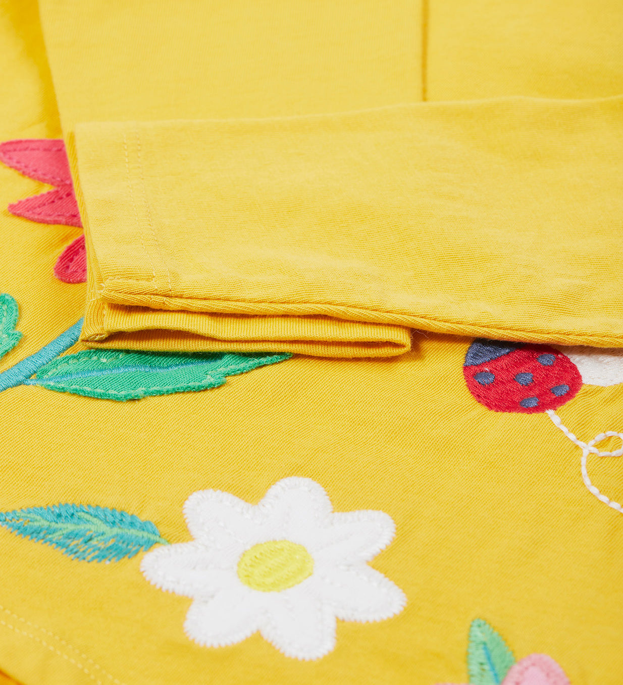 Frugi yellow long sleeve top flowers cuff detail