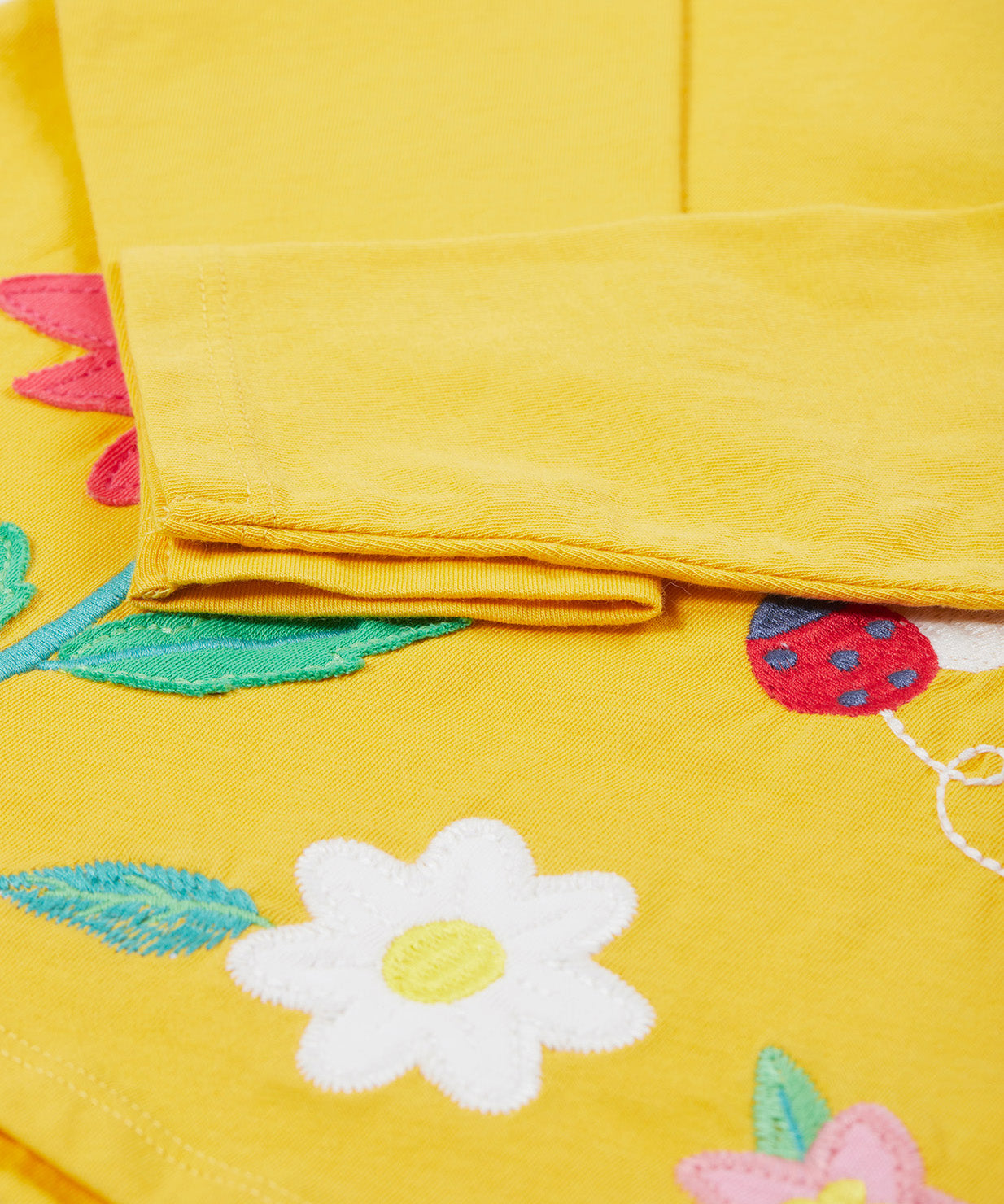 Frugi yellow long sleeve top flowers cuff detail