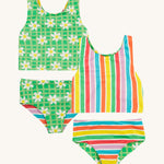 Frugi reversible tankini in a green daisy and summer stripe design on a cream background.