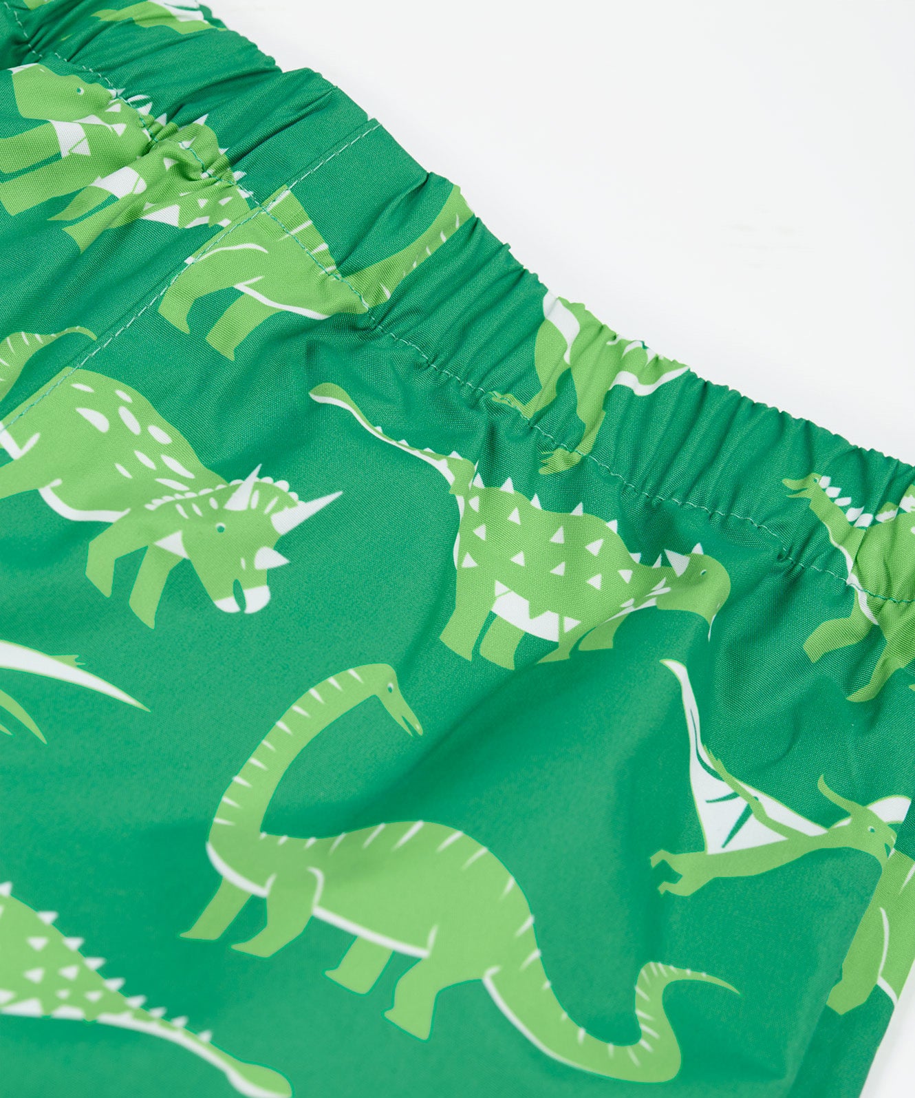 Frugi green rain and shine trousers dino roar design waist detail