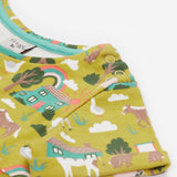 Frugi green dress farm neck and arm detail