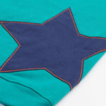 Frugi kids hoodie in a green colour and mulitcoloured block design star patch detail