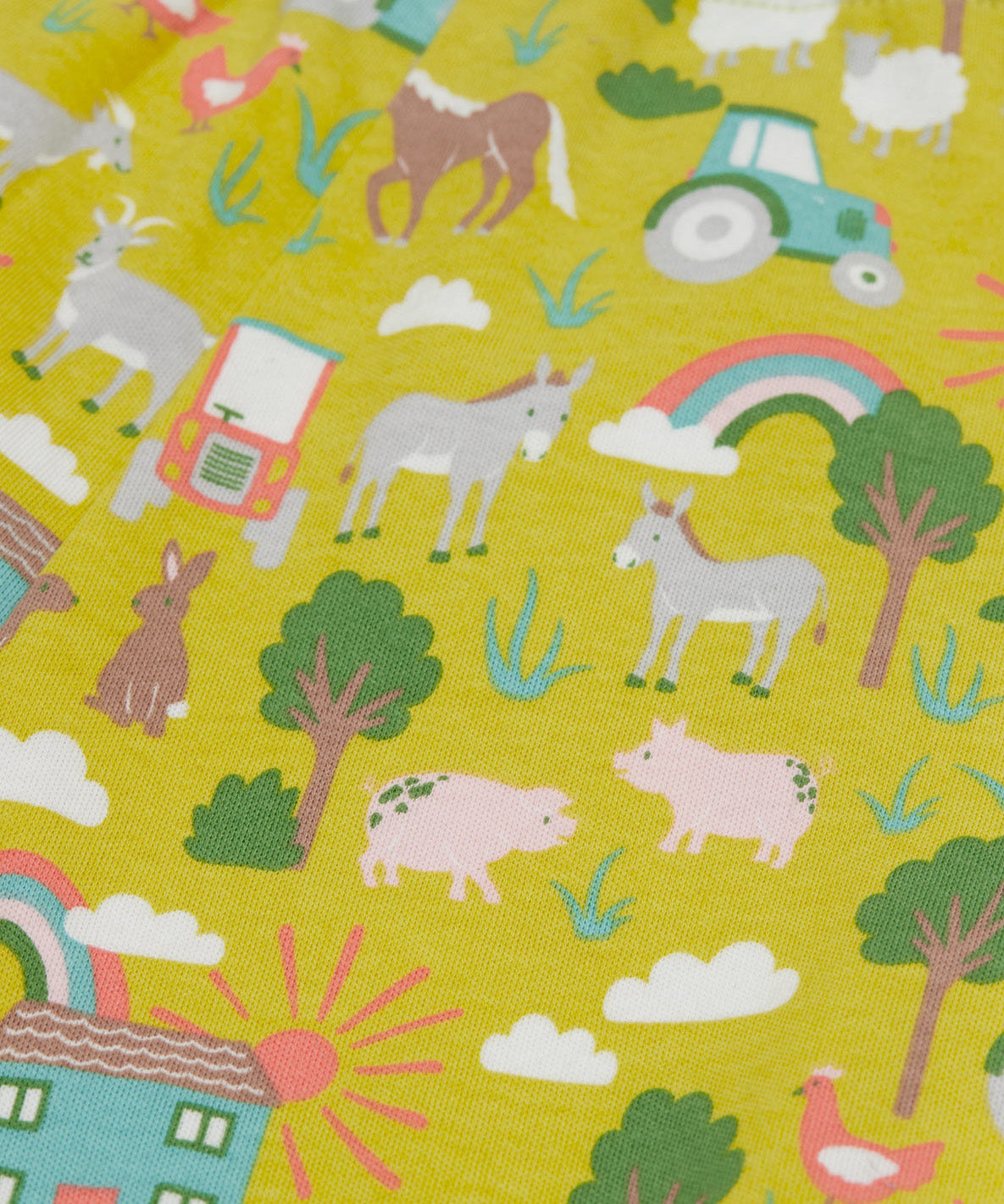 Frugi green parnsip pants farm life print detail