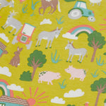 Frugi green parnsip pants farm life print detail