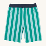 Frugi shorts in green stripes on a cream background.