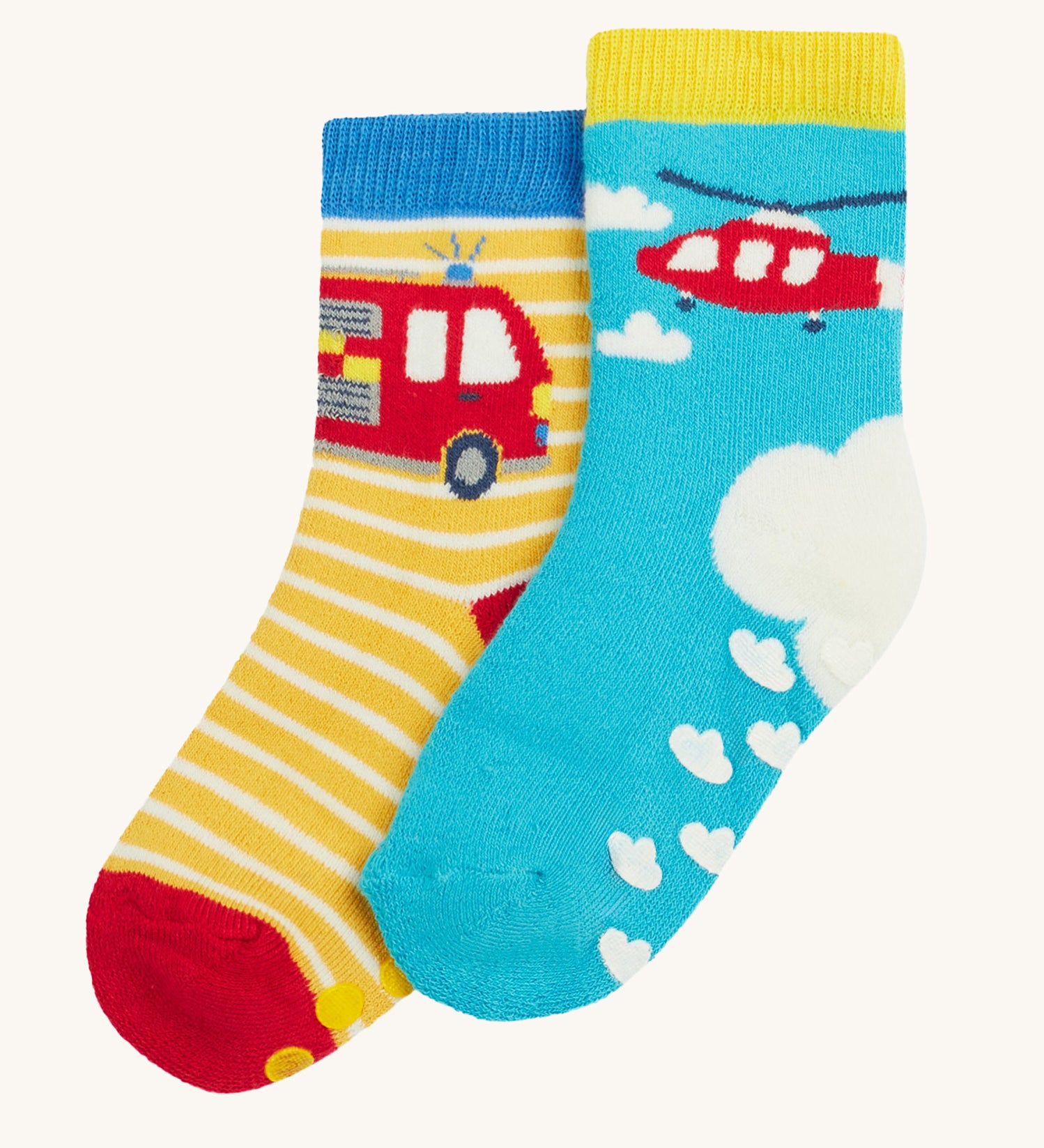 Frugi 2 pack grippy socks helicopter and fire engine design on a cream background.