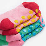 Frugi 2 pack grippy socks strawberry and ladybird sole detail