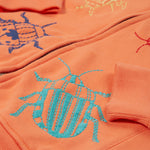 Frugi orange zip hoodie beetles design print detail