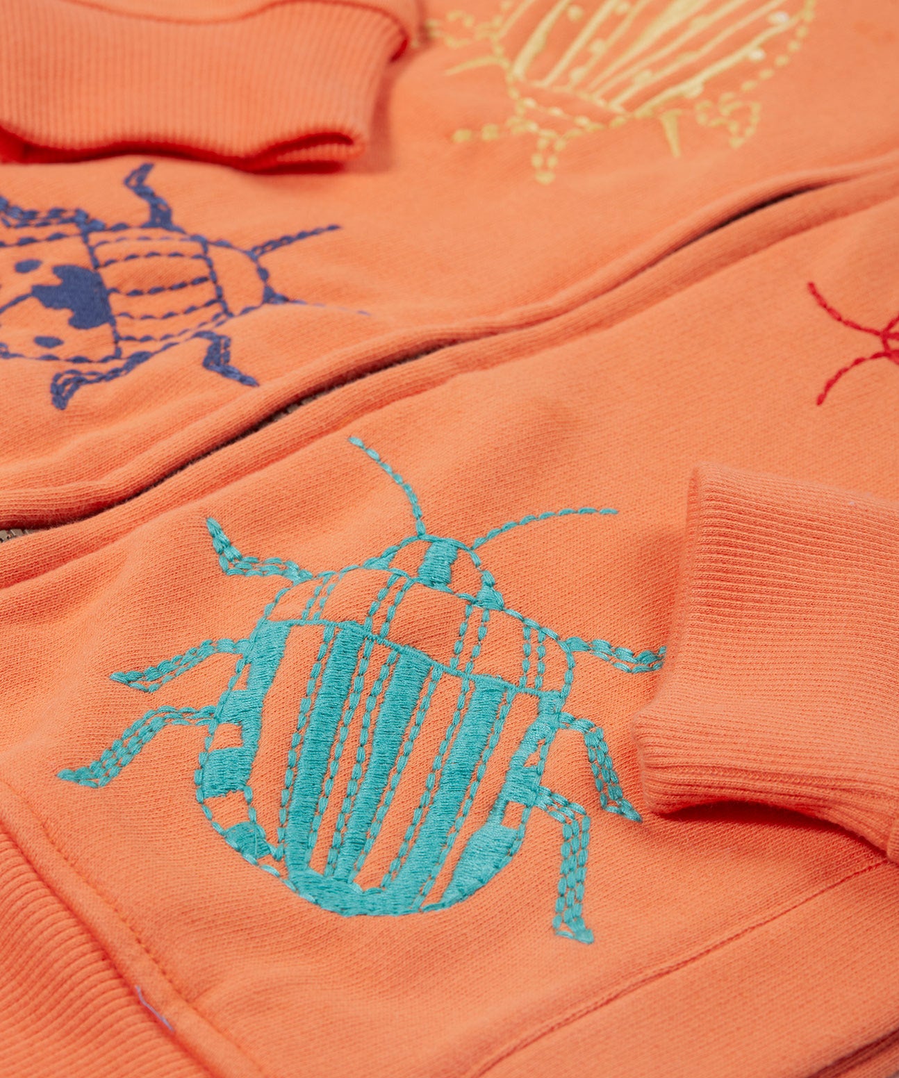 Frugi orange zip hoodie beetles design print detail