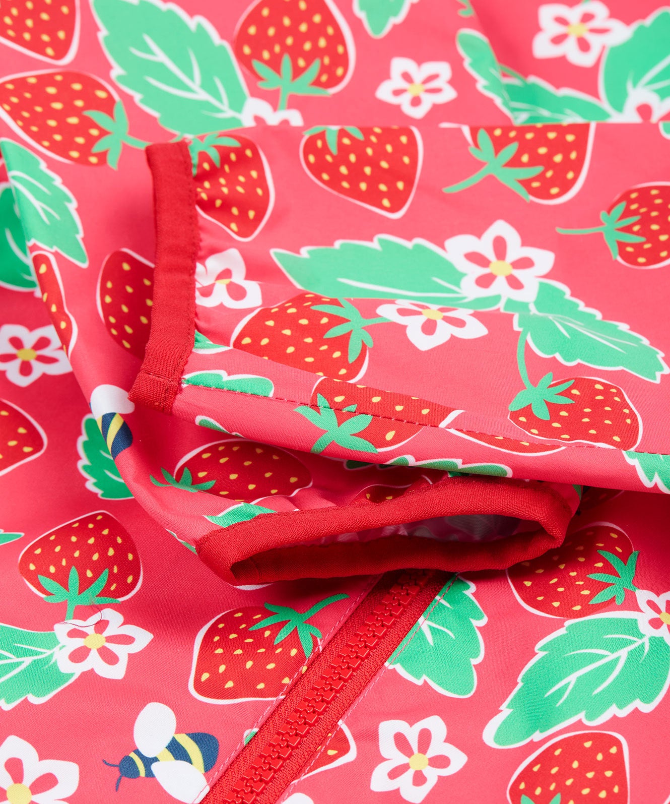 Frugi pink rain jacket strawberry pals cuff detail.