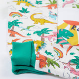 Frugi white pyjama set dinoland design cuff detail