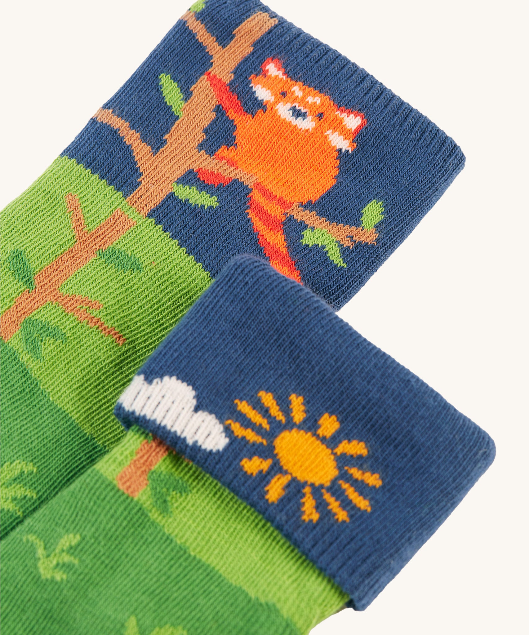 A closer look at the red panda print on the Frugi Fun Fold Over Socks - Red Panda 2 Pack