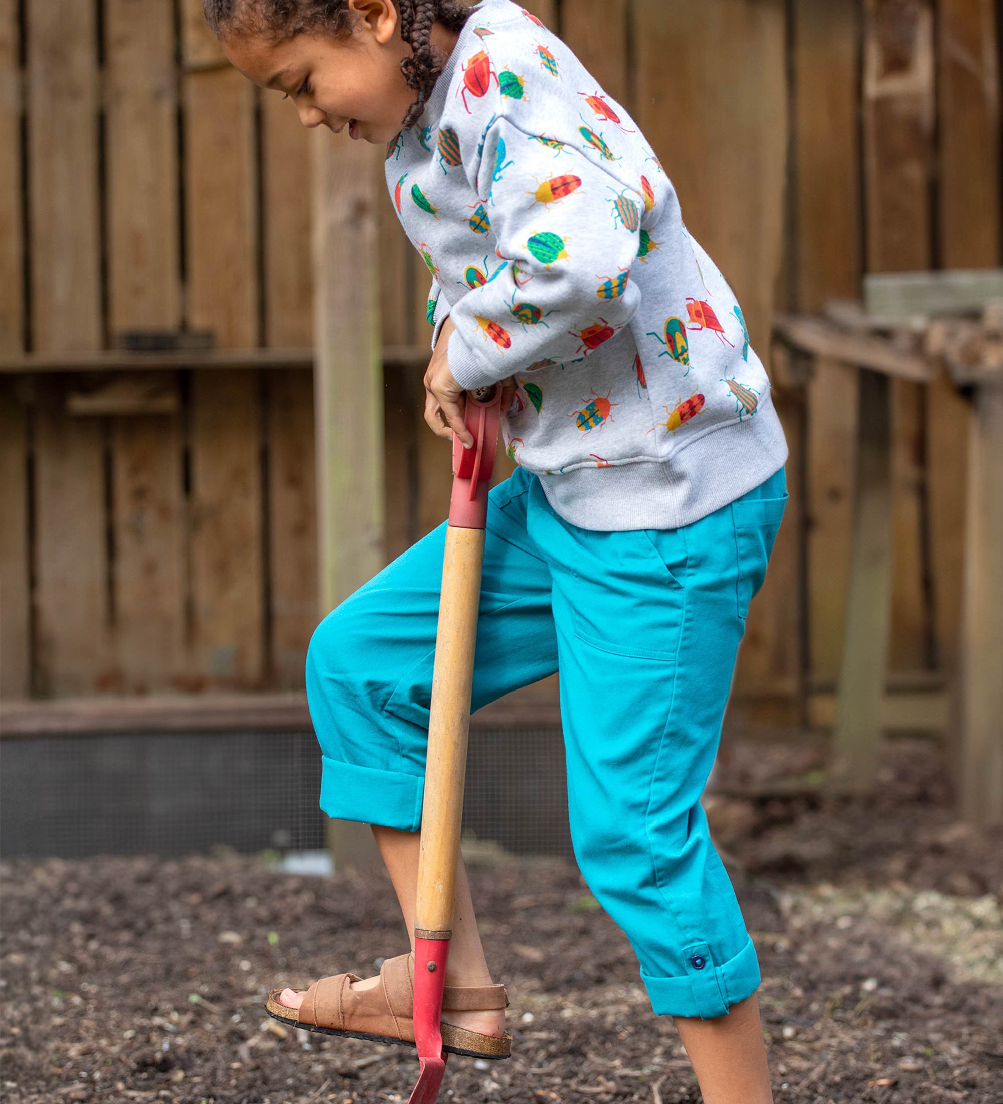 Frugi kids trousers in green, blue, turquoise colour 