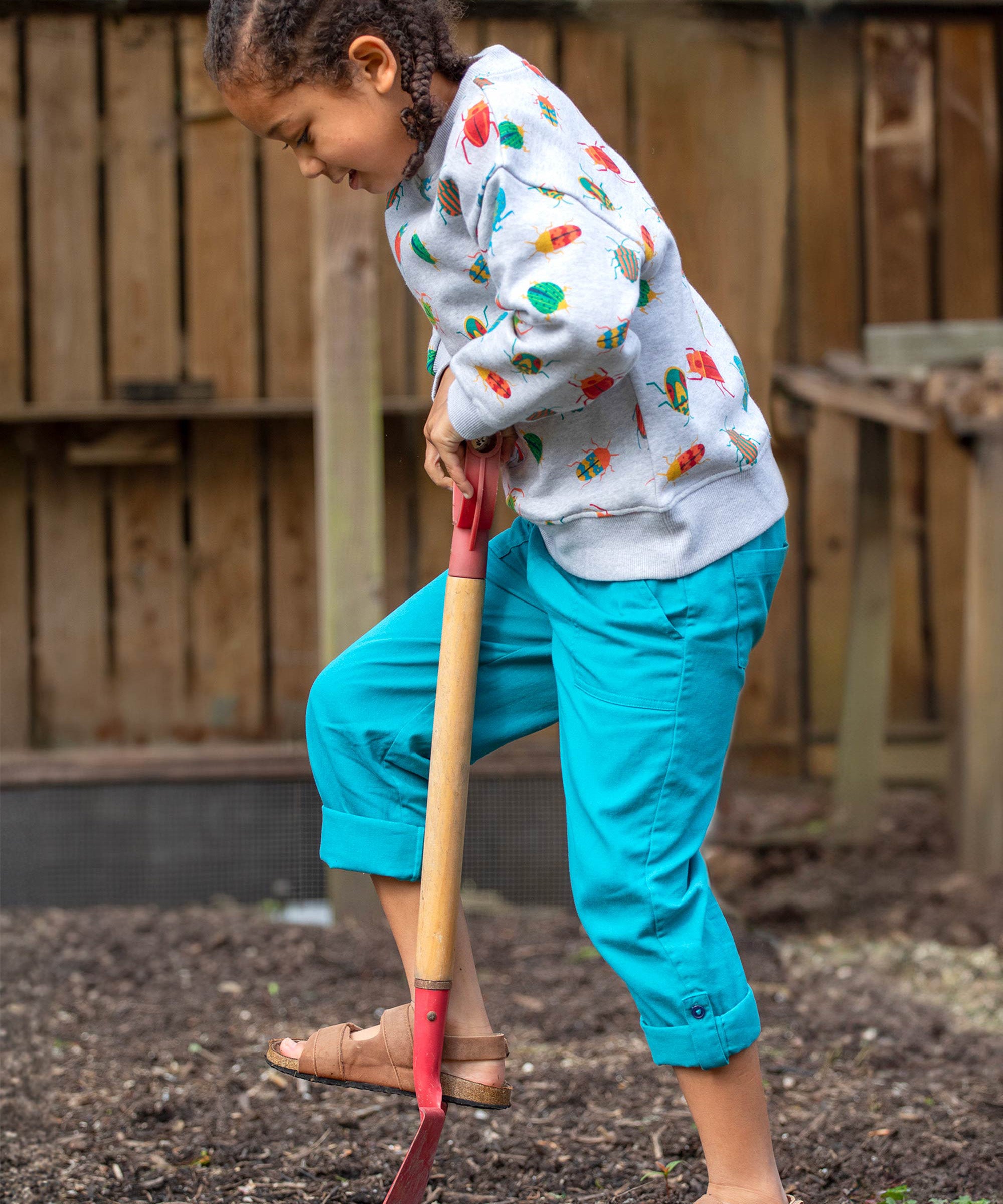 Frugi kids trousers in green, blue, turquoise colour 