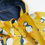 Frugi kids puddle buster jacket yellow with a puffin design hood and zip detail