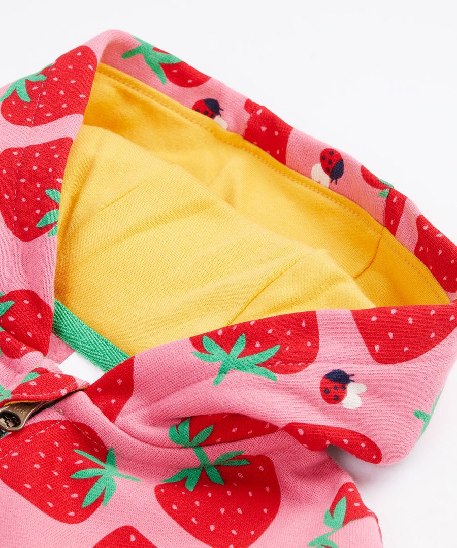 Frugi kids snuggle suit in strawberry design hood detail