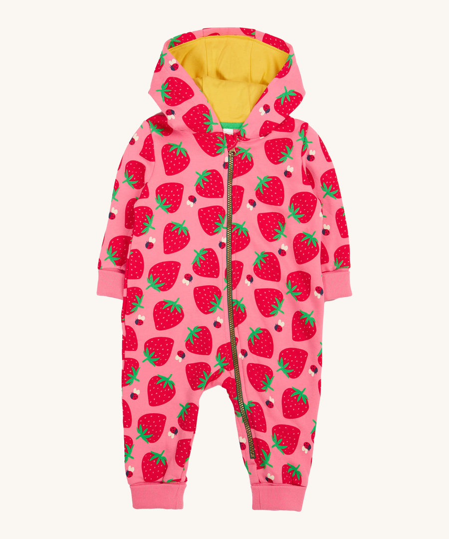 Frugi kids snuggle suit in strawberry design on a cream background