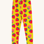 Frugi yellow leggings strawberry patch design on a cream background