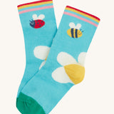 Frugi single little sock daisy design on a cream background