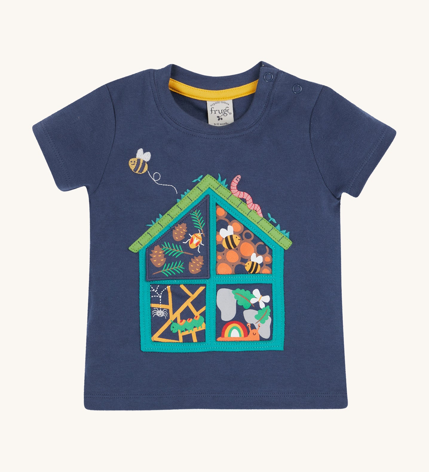 Frugi kids navy interactive short sleeve t-shirt bug hotel design on a cream background.