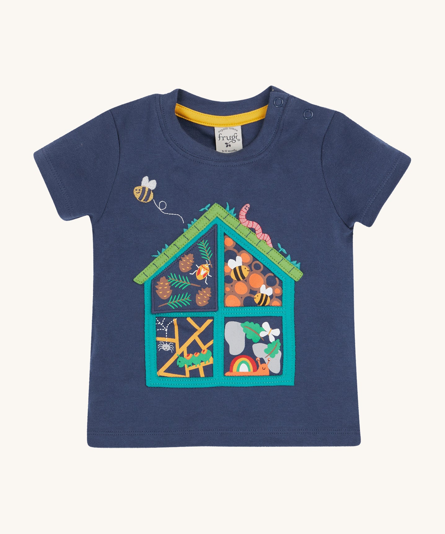 Frugi kids navy interactive short sleeve t-shirt bug hotel design on a cream background.