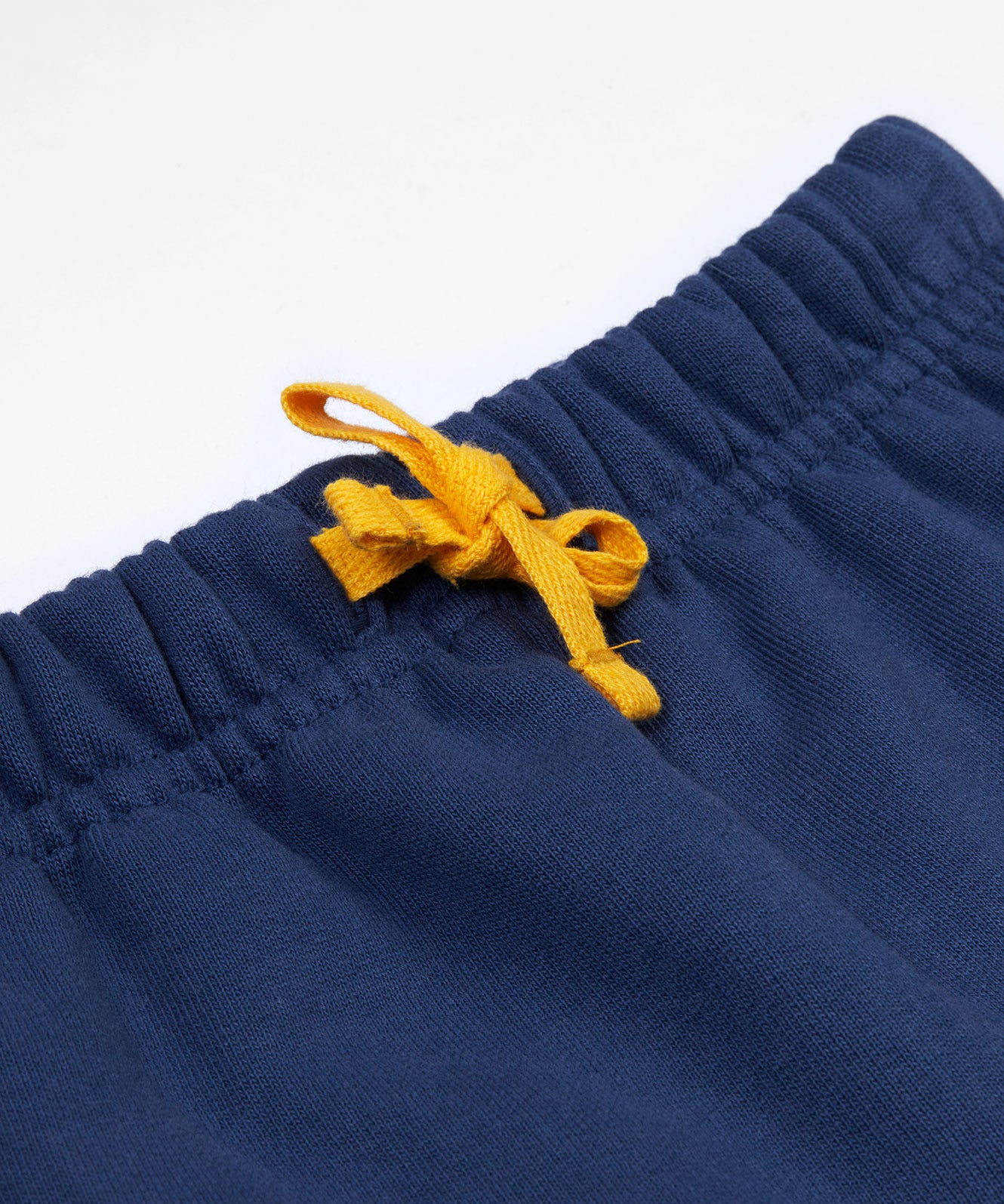 Frugi navy crawler joggers veg waist detail