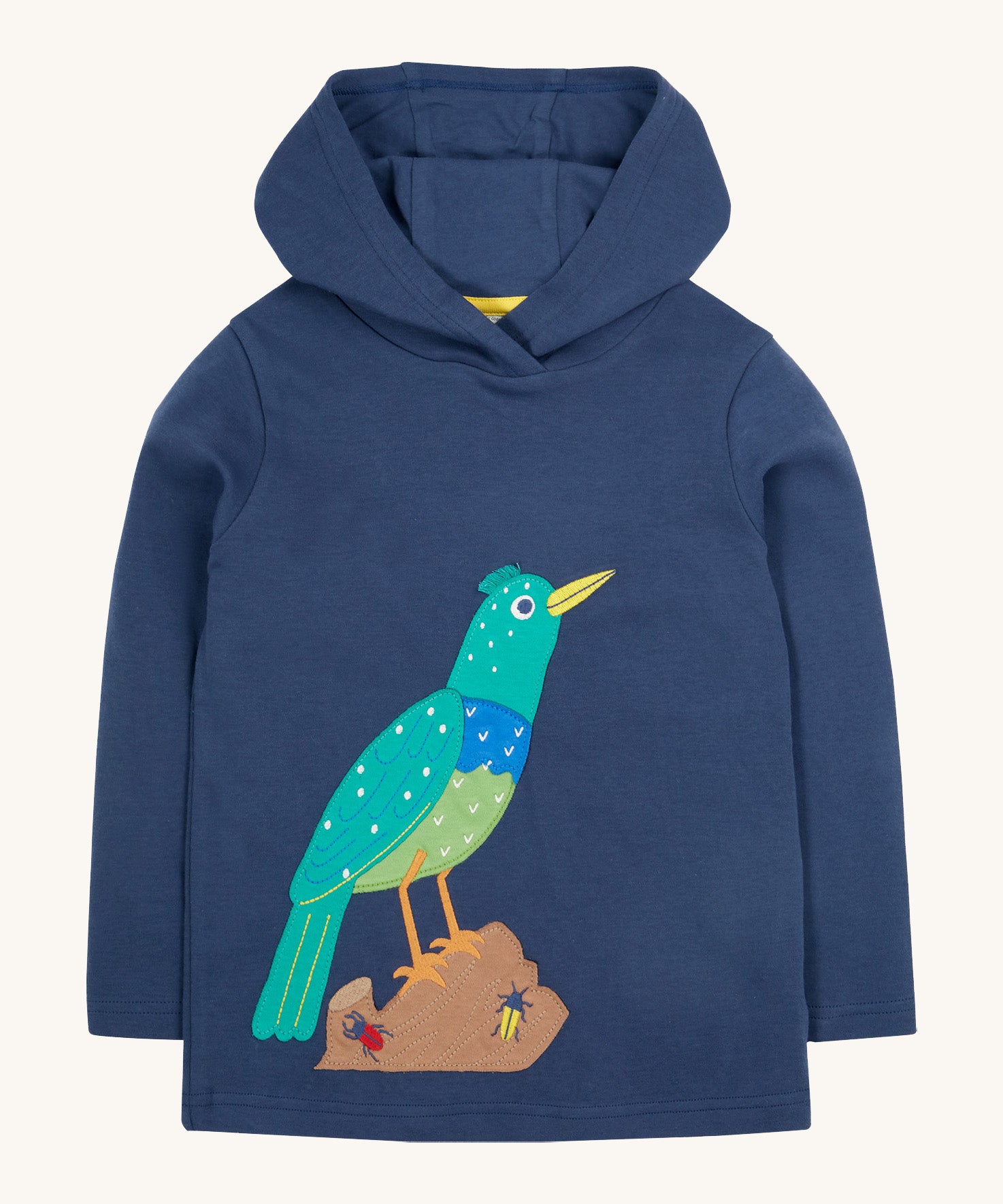 Frugi kids navy hooded top starling design on a cream background.