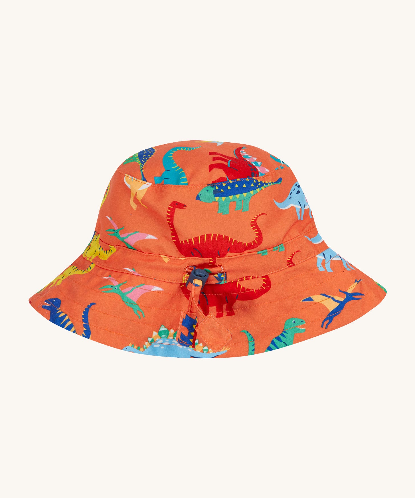 Frugi orange swim hat dino roar design on a cream background.