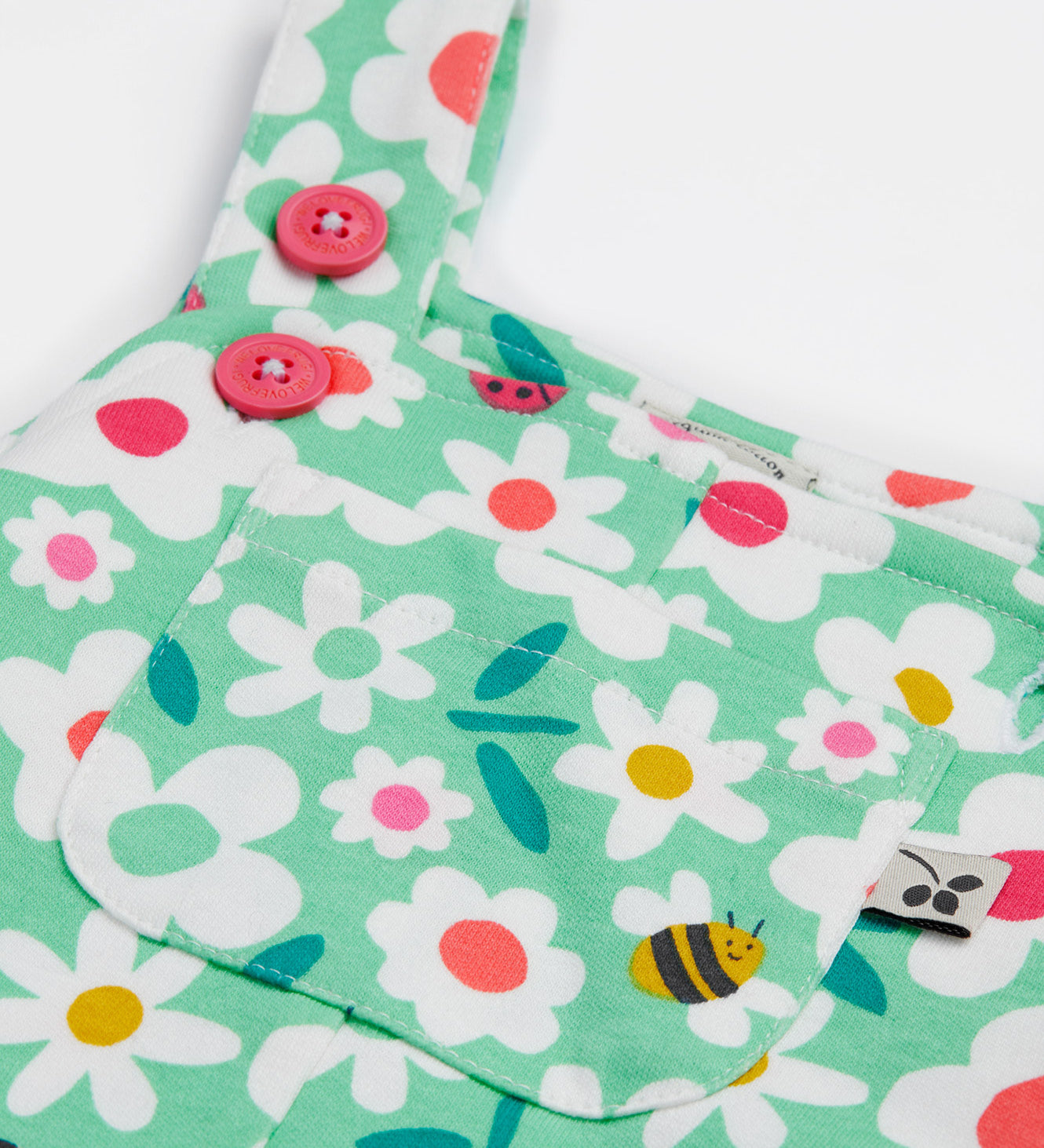 Frugi green parsnip dungarees busy bugs shoulder strap detail