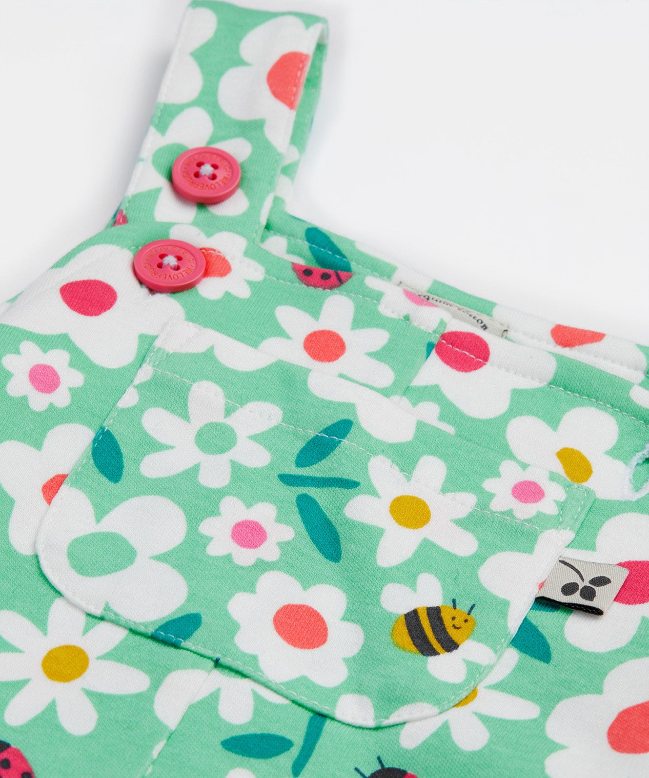 Frugi green parsnip dungarees busy bugs shoulder strap detail