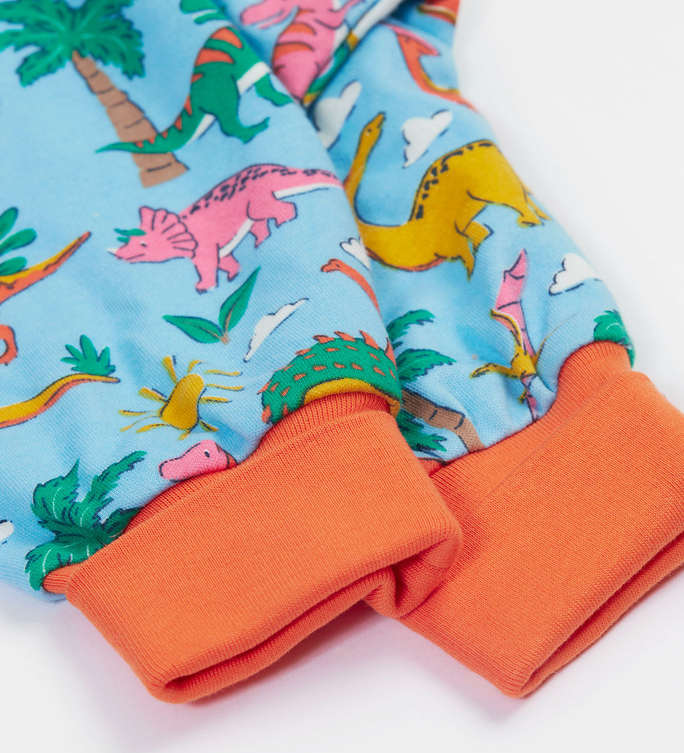 Frugi blue parsnip pants dinoland cuff detail.