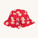 Frugi pink swim hat daisy chain design on a cream background.