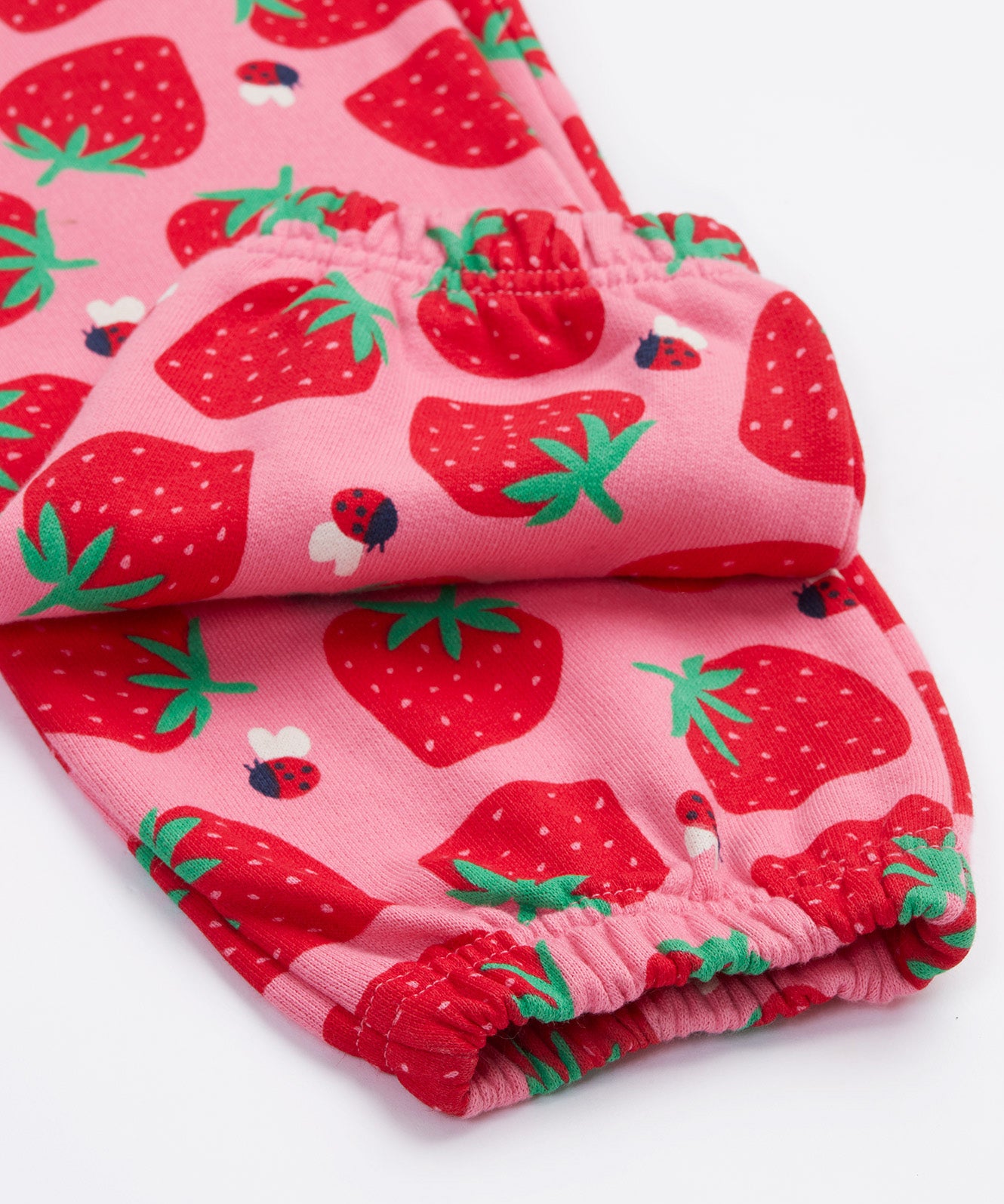 Frugi pink joggers strawberry pals cuff detail