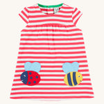 Frugi pink striped dress ladybird and bumblebee design on a cream background.